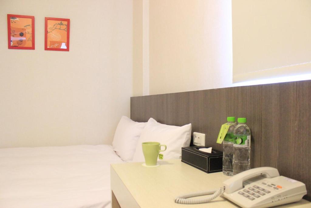 Sunnyside Hotel Гаосюн Номер фото